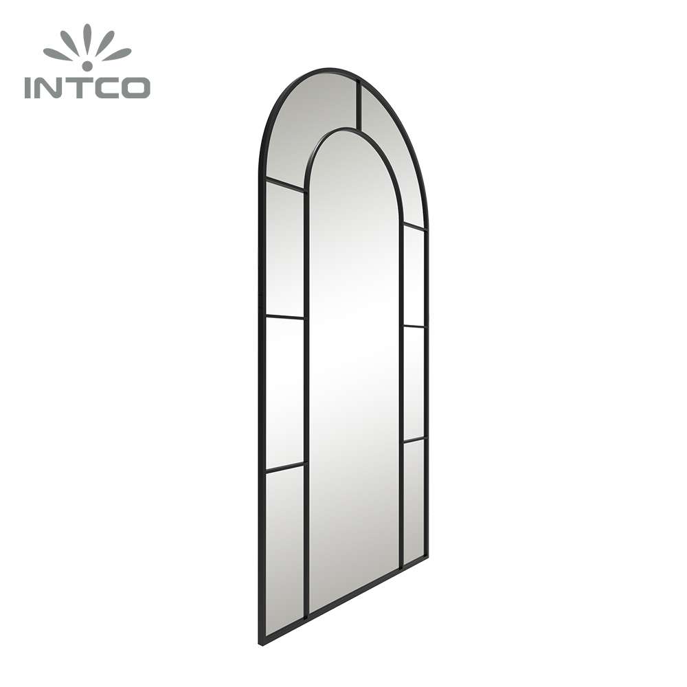 Black metal wall mirror with arched window pane frame